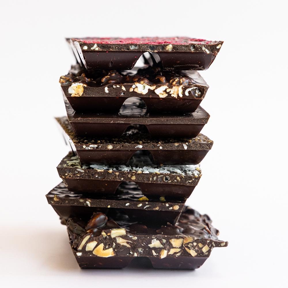 A stack of Belovd chocolate bars viewed from the side